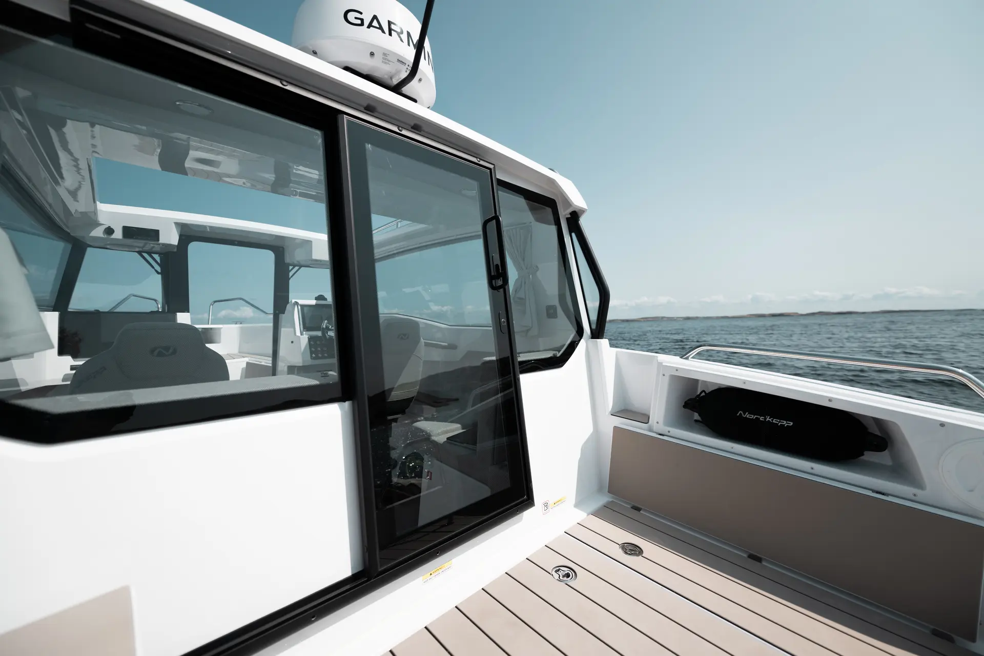 Nordkapp Coupe 780 wheelhouse cabin and interior image 18